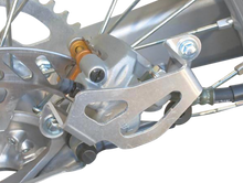 WORKS CONNECTION Rear Caliper Guard - RM125/250 25-015