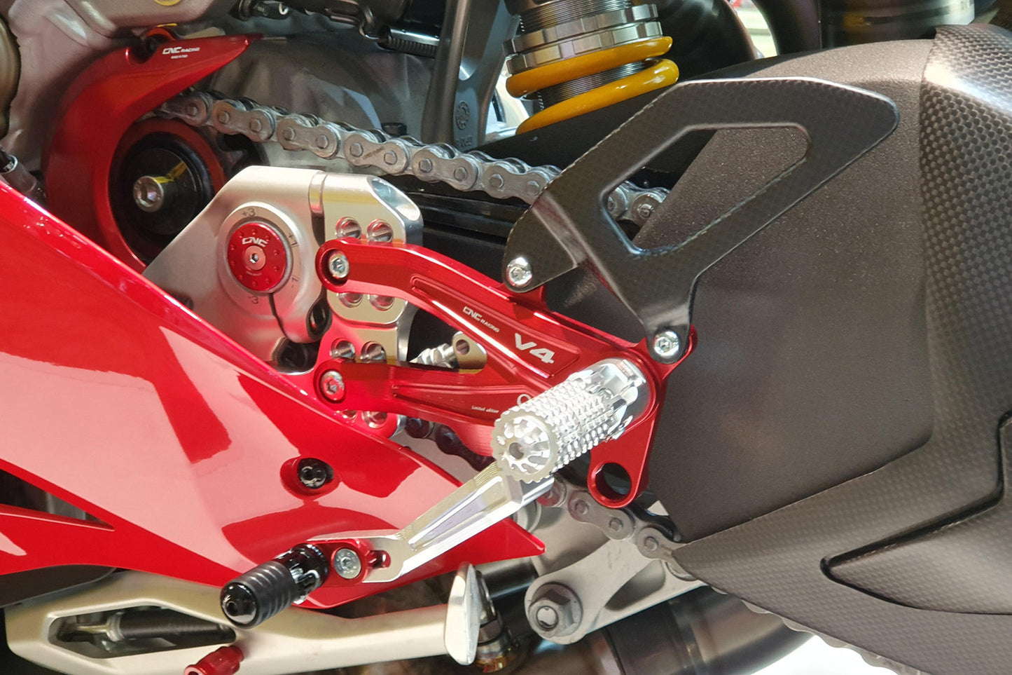 CNC Racing Carbon Fiber Heel Guards for the RPS Adjustable Rearset for the Ducati Panigale / Streetfighter V4 / S / Speciale / R